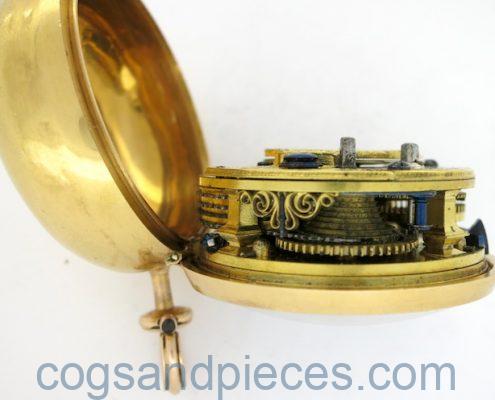 Gold repousse pair cases, verge