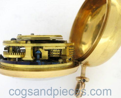 Gold repousse pair cases, verge