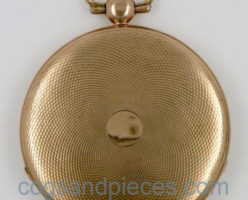 Gold, jump hour cylinder pocket watch