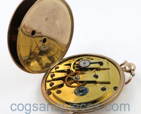Gold, jump hour cylinder pocket watch