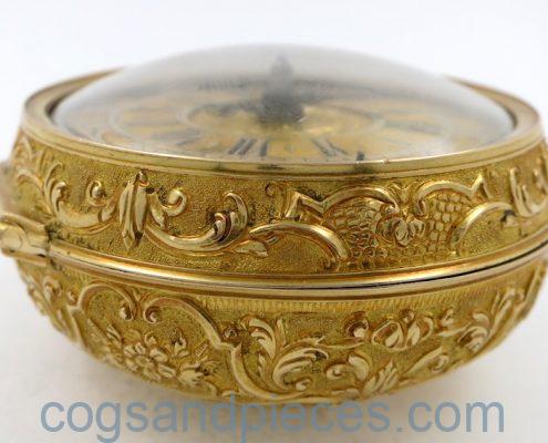Gold repousse pair cases
