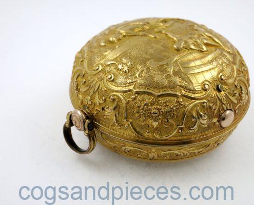 Gold repousse pair cases