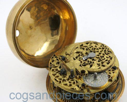 Gold repousse pair cases