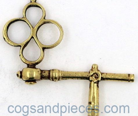 Gold crank watch key