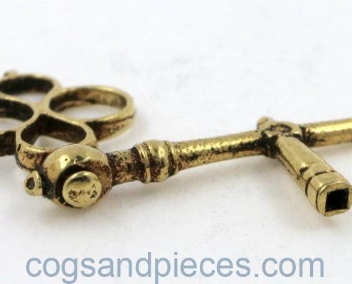Gold crank watch key