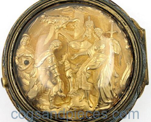 Gold repousse verge
