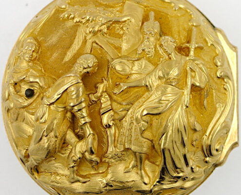 Gold repousse verge