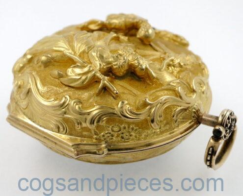 Gold repousse verge