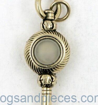 Gold watch key
