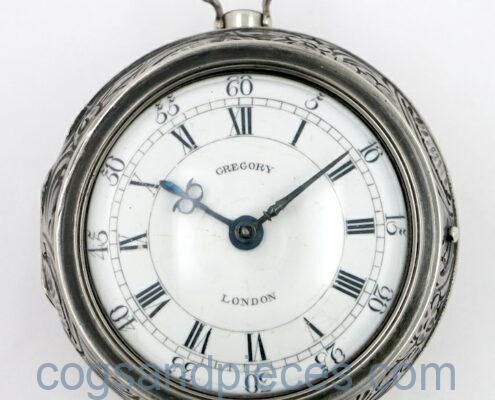 Silver repousse pair cases