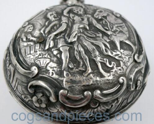 Silver repousse pair cases