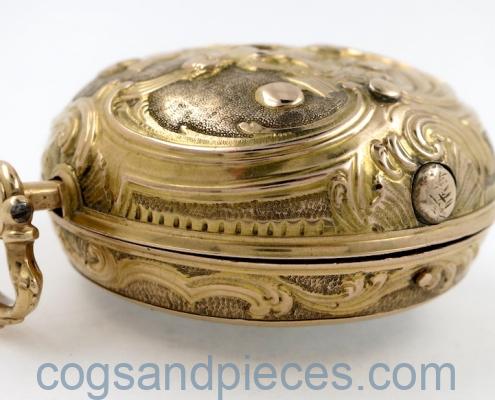 Gold repousse pair cases