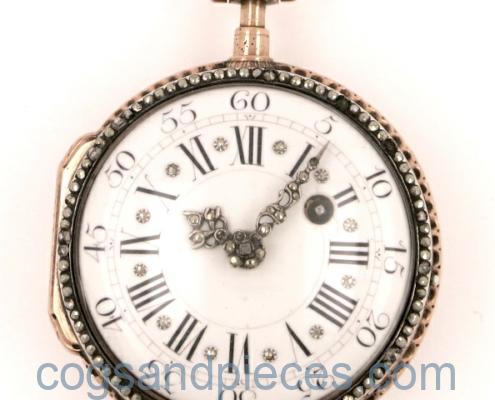 gold skeletonised pocket watch