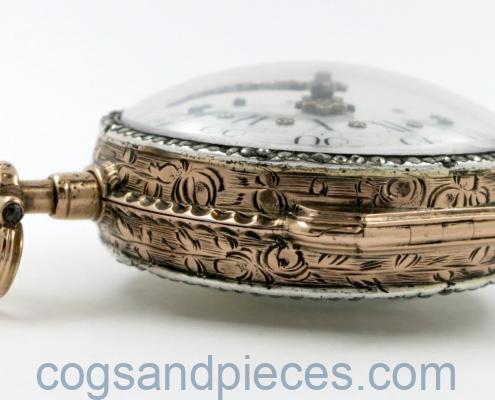 gold skeletonised pocket watch