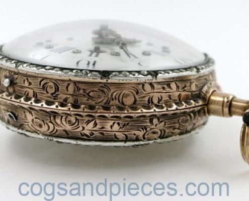 gold skeletonised pocket watch