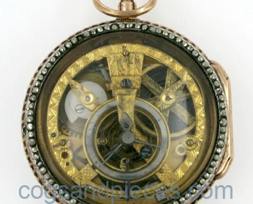 gold skeletonised pocket watch