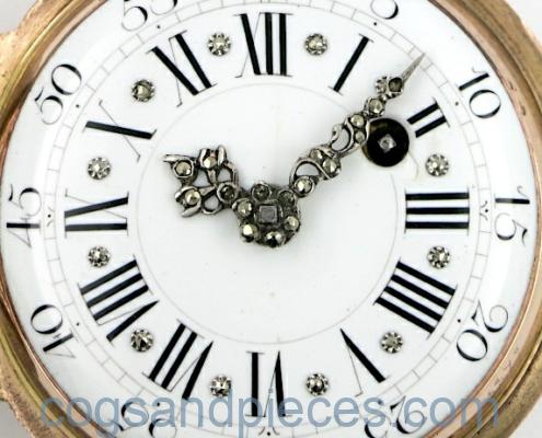 gold skeletonised pocket watch