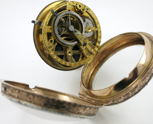 gold skeletonised pocket watch