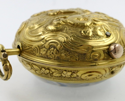 Gold repousse watch