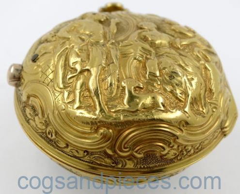 Gold repousse watch