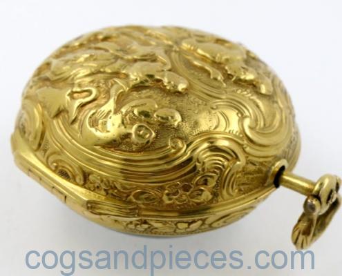Gold repousse watch