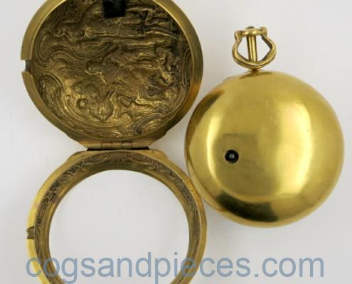 Gold repousse watch