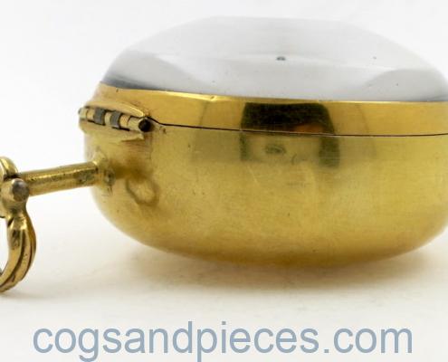 Gold repousse watch