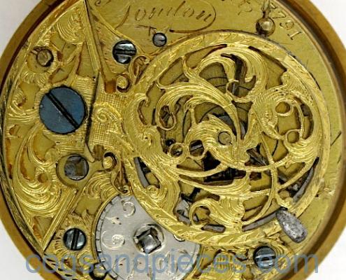 Gold repousse watch